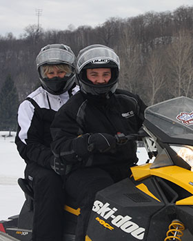 learn snowmobiling techniques and trail side etiquette